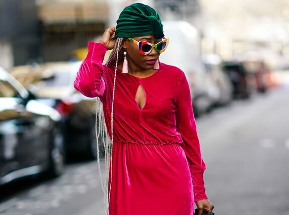 woman wearing a red velvet dress