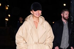 Chrissy Teigen Just Wore the Winter Coat Thatâs Essentially a Bathrobe tout