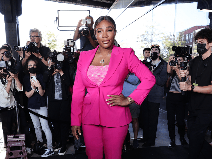 Serena Williams wearing pink suit on red carpet