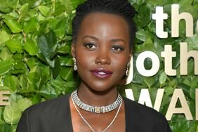 Lupita Nyong'o wears short hair before shaving it all off. 