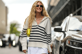 Girl smiling wearing striped sweater