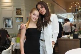 Harper and Victoria Beckham Posing and Hugging at Vogue100 Ladies Event