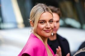 Kelsea Ballerini InStyle Interview _ Kelsea Ballerini smiling in a pink coat