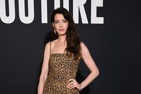 Anne Hathaway Paris Fashion Week cheetah print