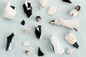 Broken bride and groom figurines