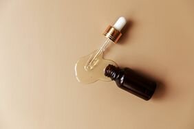 Spilled bottle of retinol serum