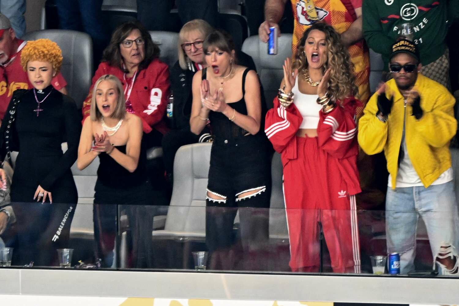 US singer-songwriter Taylor Swift (3rd R), US rapper Ice Spice (L), Ashley Avignone (2nd L) and US actress Blake Lively (2nd R) attend Super Bowl LVIII 