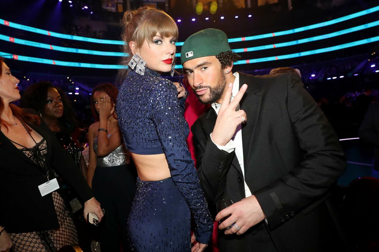 taylor swift and bad bunny pose together at the grammys